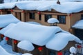 The thick snow on the houses scenery