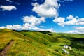 The blue sky and summer mountains