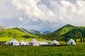 The mongolia yurts in the high mountain meadow