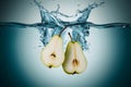 PhotoStock An artistic depiction of water splash with sliced pears Royalty Free Stock Photo