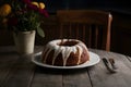 PhotoStock Baba au rhum on kitchen table, a decadent dessert delight