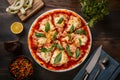 PhotoStock Birds eye view of pizza on kitchen table, deliciously tempting