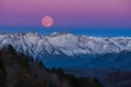 PhotoStock Full moon over mountain range, tranquil natural landscape scene Royalty Free Stock Photo