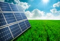Photovoltaic ecological modules on green grass valley. Royalty Free Stock Photo