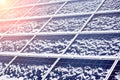 Photovoltaic ecological modules slightly blown by snow Royalty Free Stock Photo