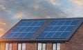 Photovoltaic solar panels on the roof of new house. Roof with solar panels Royalty Free Stock Photo