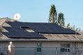 Photovoltaic solar panels on a tiled roof Royalty Free Stock Photo