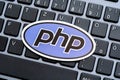 PHP programming language logo symbol on a modern desktop PC computer keyboard, website development, web apps and server side Royalty Free Stock Photo