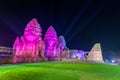 Phra Prang Sam Yot or three-pronged holy tower decorated with lights at night. It is a famous Landmark historical tourist