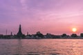 Phra Prang Wat Arun, The beautiful temple along the Chao Phraya river at sunset in Bangkok, Thailand Royalty Free Stock Photo