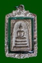 Phra Somdej of Thailand isolated on green background