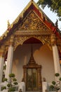 Phra Viharn Kod decorative entrance door and roof at Wat Pho temple. Royalty Free Stock Photo