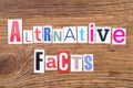 Phrase `Alternative Facts` on wooden background