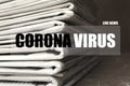 Phrase Corona Virus and stack of newspapers, closeup. Journalist`s work Royalty Free Stock Photo