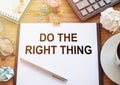 The phrase Do The Right Thing typed on a paper on office table. A reminder to make the right choices according to your moral Royalty Free Stock Photo