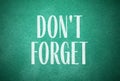Phrase Don`t forget written on green Royalty Free Stock Photo
