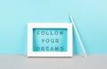 The phrase follow your dreams is standing in the frame, choaching concept, positive and optimistic thinking, having a goal Royalty Free Stock Photo