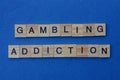 Phrase gambling addiction made from gray wooden letters Royalty Free Stock Photo