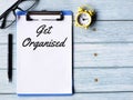 Phrase get organised written on paper clipboard Royalty Free Stock Photo