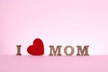 Phrase I LOVE MOM made of wooden letters Royalty Free Stock Photo