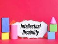 Phrase intellectual disability written on strip paper