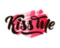 Phrase Kiss me hand lettering on watercolor spot. Vector