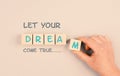 The phrase let your dream come true is standing on a progress bar, choaching and motivation concept, positive mindset Royalty Free Stock Photo