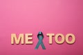 Phrase Me Too made of wooden letters and teal awareness ribbon on pink background, top view. Stop assault