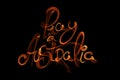 The phrase Pray for Australia made of fire flame or smoke. Poor animals die in flames. Unmanageable fire and disaster Royalty Free Stock Photo