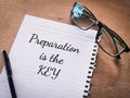 Phrase Preparation is the key written on a piece of paper Royalty Free Stock Photo