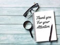 Phrase THANK YOU FOR YOUR ATTENTION written on note book