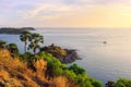 Phromthep Cape at the sunset, picturesque Andaman sea view in Phuket island, Thailand. Seascape with cliff and green palm trees. Royalty Free Stock Photo