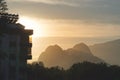 Sunset over the city with mountains in the background (Antalya, Turkey) - Turkish public housing Royalty Free Stock Photo