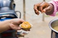 Phuchka or Pani Puri being served on a bowl made of shal leaves in india. This popular street food is also called gupchup or