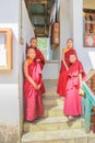 Phuentsholing, Bhutan - September 16, 2016: Young Bhutanese monks standing on the stairs of a monastery at Phuentsholing Town