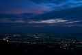 Phuket city at night with dramatic clouds and sky.