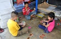 Phuket City, Thailand: Children Playing Cards