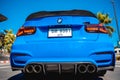 PHUKET, THAILAND- DECEMBER 25, 2023: Beautiful bright blue BMW M3 series in the parking lot. Royalty Free Stock Photo