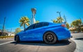 PHUKET, THAILAND- DECEMBER 25, 2023: Beautiful bright blue BMW M3 series in the parking lot. Royalty Free Stock Photo