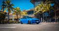 PHUKET, THAILAND- DECEMBER 25, 2023: Beautiful bright blue BMW M3 series in the parking lot. Royalty Free Stock Photo