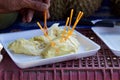 Phuket, Thailand food market: pieces of fresh durian to sample