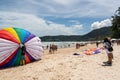 Crowds of tourists vacation on Patong beach in Phuket, Thailand