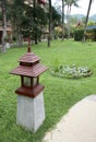 PHUKET, THAILAND - JUNE 12, 2018: Decorative lantern next to a path in the territory of the Phuket Orchid Resort and Spa hotel