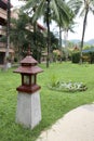 PHUKET, THAILAND - JUNE 12, 2018: Decorative lantern next to a path in the territory of the Phuket Orchid Resort and Spa hotel