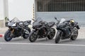 row of parked motorbikes on Talang's central street