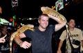 Phuket, Thailand: Man Posing with Lizards