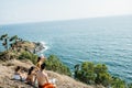 Asia Tourists looking to Seascape of Phuket Best View Point Sunset