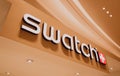 PHUKET, THAILAND - MAY 29, 2022: Swatch brand retail shop logo signboard on the storefront in the shopping mall