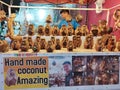 Handmade monkey sculptures out of coconut for sale at dragon night market in Phuket, Thailand