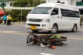 PHUKET, THAILAND - NOVEMBER 3 : Van accident on the road and crashed with motorcycle which causing the rider serious injury.